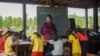 Soeun Sreynith, 25, runs multiple informal classroom sessions daily from her house in Samlout district, Battambang province, Cambodia, June 17, 2020. (Khan Sokummono/VOA Khmer) 