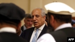 FILE - U.S. Special Representative for Afghanistan Reconciliation Zalmay Khalilzad attends the Intra Afghan Dialogue talks in the Qatari capital, Doha, July 8, 2019.