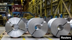 Raw steel coils are seen on the floor of the galvanizing line at ArcelorMittal Dofasco in Hamilton, Ontario, Canada, Feb. 14, 2025. U.S. President Donald Trump on March 11, 2025, doubled the U.S. tariff on Canada’s steel and aluminum exports.