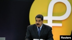 Presiden Venezuela Nicolas Maduro pada peluncuran mata uang digital Petro di Caracas, Venezuela, Selasa (20/2). 