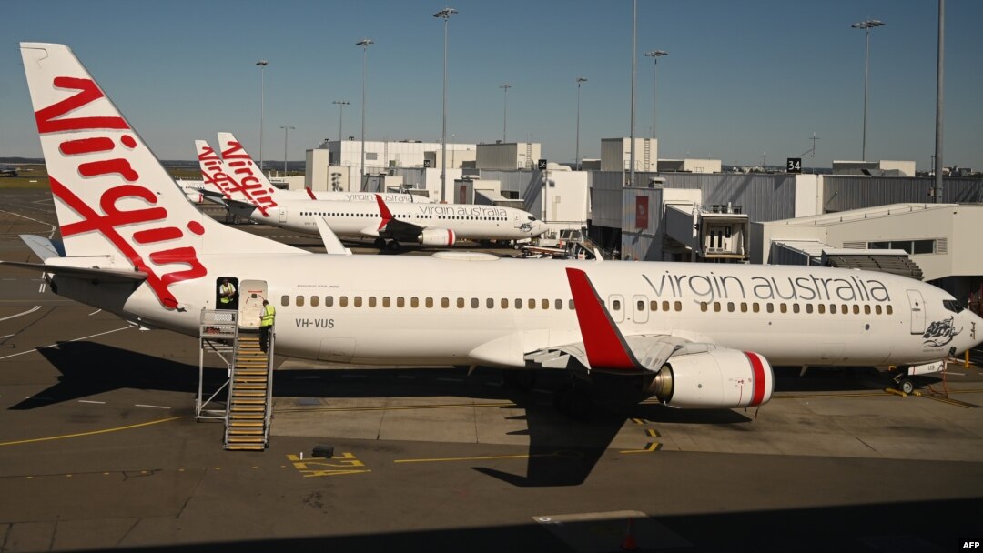 Pesawat milik maskapai penerbangan Virgin Australia terlihat di bandara Sydney, 5 Agustus 2020.