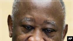 Ivory Coast's former president Laurent Gbagbo waits for judges to arrive for his initial court appearance at the International Criminal Court in The Hague December 5, 2011. Gbagbo appeared at the International Criminal Court on Monday, facing charges of c