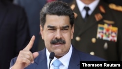 រូបឯកសារ៖ ប្រធានាធិបតី​វ៉េណេស៊ុយអេឡា​លោក Nicolas Maduro ធ្វើ​សន្និសីទ​សារព័ត៌មាន​នៅ​វិមាន Miraflores ក្នុង​ទីក្រុង Caracas។