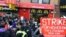 A coalition of groups rally in front of a McDonald's on East 125th Street and Lexington Avenue in Harlem during a protest by fast food workers and supporters for higher wages in New York, Apr. 4, 2013.