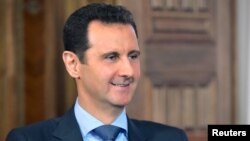 Syrian President Bashar al-Assad railed against foreign interference in an interview with al-Manar. Syria’s national news agency SANA distributed a photo from the interview, Aug. 25, 2015.