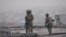 Gaashaan soldiers shortly after re-taking control of the Somali parliament building from al-Shabab fighters in on May 24, 2014. (Somalia Handout Photo)