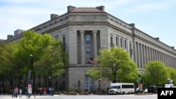 FILE - The Department of Justice in Washington, on April 16, 2019.