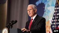 FILE - U.S. Vice President Mike Pence speaks on the future of the U.S. relationship with China at the Wilson Center in Washington, Oct. 24, 2019.