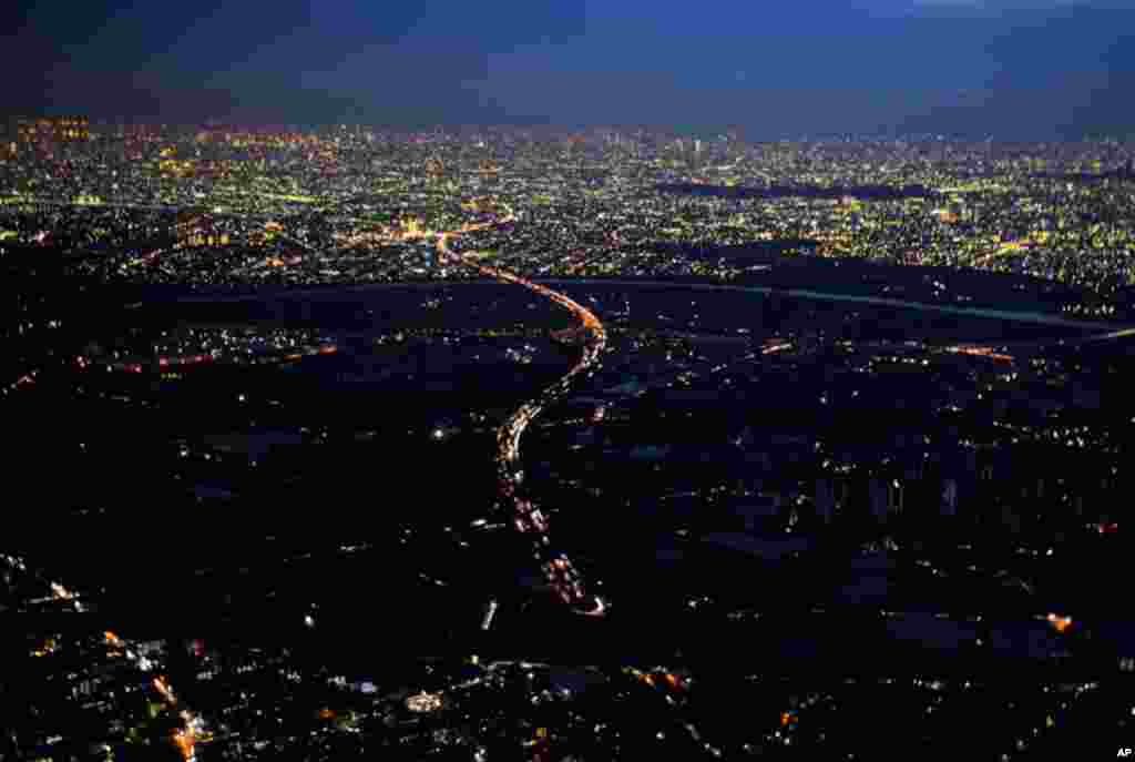 March 18: Lights are turned off during rolling blackouts in Misato City, Japan. Tokyo Electric Power Co. announced the rolling blackouts after its power generation was cut due to damage to its Fukushima Daiichi power plant, where it is struggling to preve