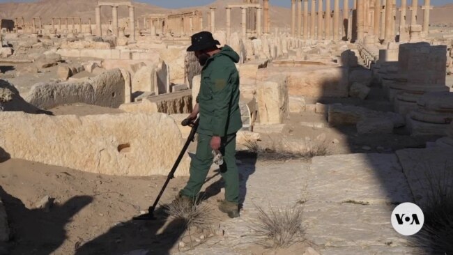 Landmines slow return to Palmyra, Syria, home of famed ancient ruins 