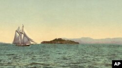 About 1900, the Detroit Publishing Co. made a postcard out this view of Alcatraz Island, which was then a military prison.