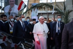 Papa Francis akiwa Iraq baada ya kuendesha inada.