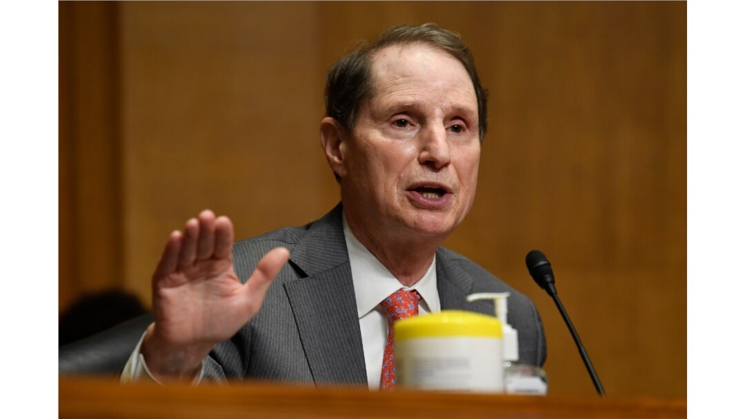 FILE - Sen. Ron Wyden at a Senate Finance Committee hearing on Capitol Hill in Washington, June 30, 2020.