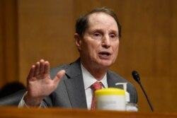 FILE - Sen. Ron Wyden, D-Ore., speaks at a committee hearing on Capitol Hill in Washington, June 30, 2020.