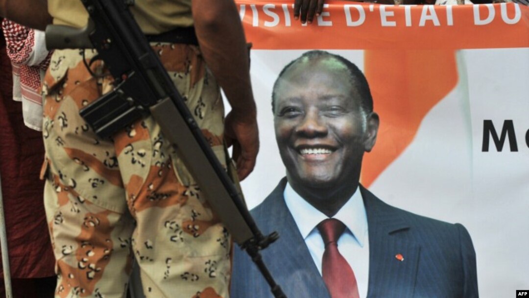 A soldier from the United Nations Operation in Côte d'Ivoire (UNOCI) stands guard before the arrival of Ivory Coast's President in Duekoue on April 23, 2012. President Alassane Ouattara vowed that all those behind killings during Ivory Coast's post-poll c