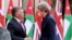 British Prime Minister Theresa May meets King Abdullah at the Royal Palace in Amman, Jordan, during her visit to the Middle East, Nov. 30, 2017.