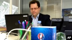 Ziad Khoury, the security director for the Euro 2016 soccer championships, works in his office after an AP interview, May 17, 2016, in Paris. Khoury said anti-drone technology would be deployed as part of security measures to protect the tournament.