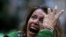 A Brazil soccer fan cries as Germany scores against her team at a semifinal World Cup match as she watches the game on a live telecast in Belo Horizonte, Brazil, July 8, 2014.
