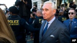 FILE - Former campaign adviser for President Donald Trump, Roger Stone, leaves federal court, Feb. 21, 2019, in Washington. 