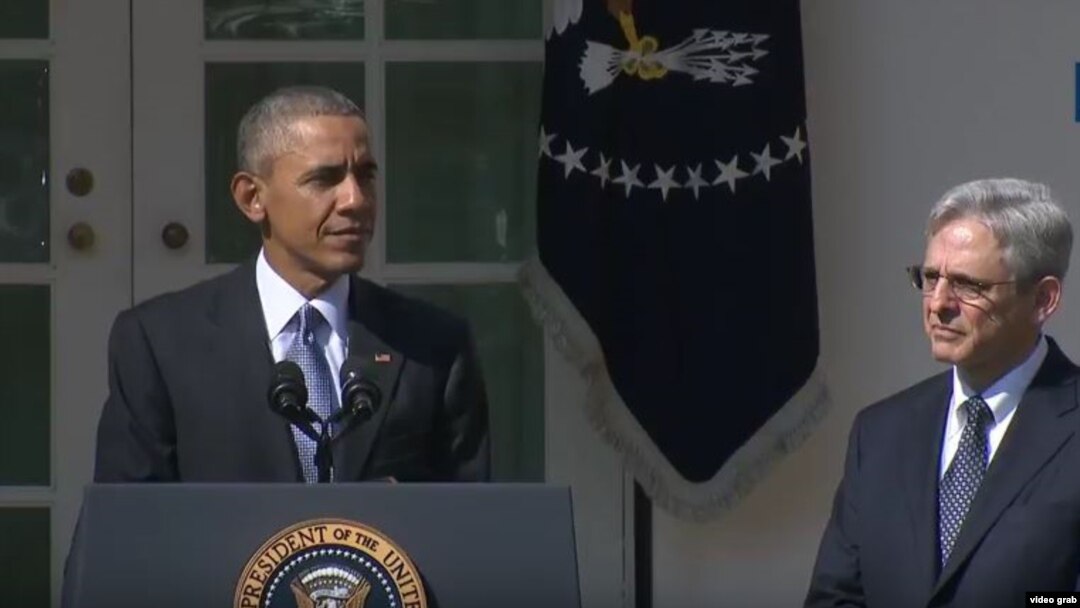 Madaxweyne Obama (Bidix) iyo Merrick Garland (Midig)