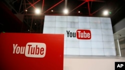 FILE - Signage is seen inside the YouTube Space LA offices in Los Angeles, California, Oct. 21, 2015. 