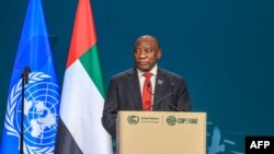 South Africa's President Cyril Ramaphosa speaks during the High-Level Segment for Heads of State and Government session at the United Nations climate summit in Dubai on December 1, 2023.