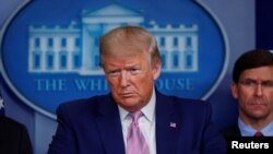 FILE - U.S. President Donald Trump addresses a briefing at the White House in Washington, April 1, 2020.