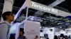 FILE - Tencent sign is seen at the World Artificial Intelligence Conference in Shanghai, China July 6, 2023.