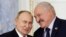 FILE - Russian President Vladimir Putin and Belarusian President Alexander Lukashenko shake hands during a meeting in St. Petersburg, Russia, on Jan. 29, 2024. Lukashenko has depended on Russian support throughout his 30-year rule.