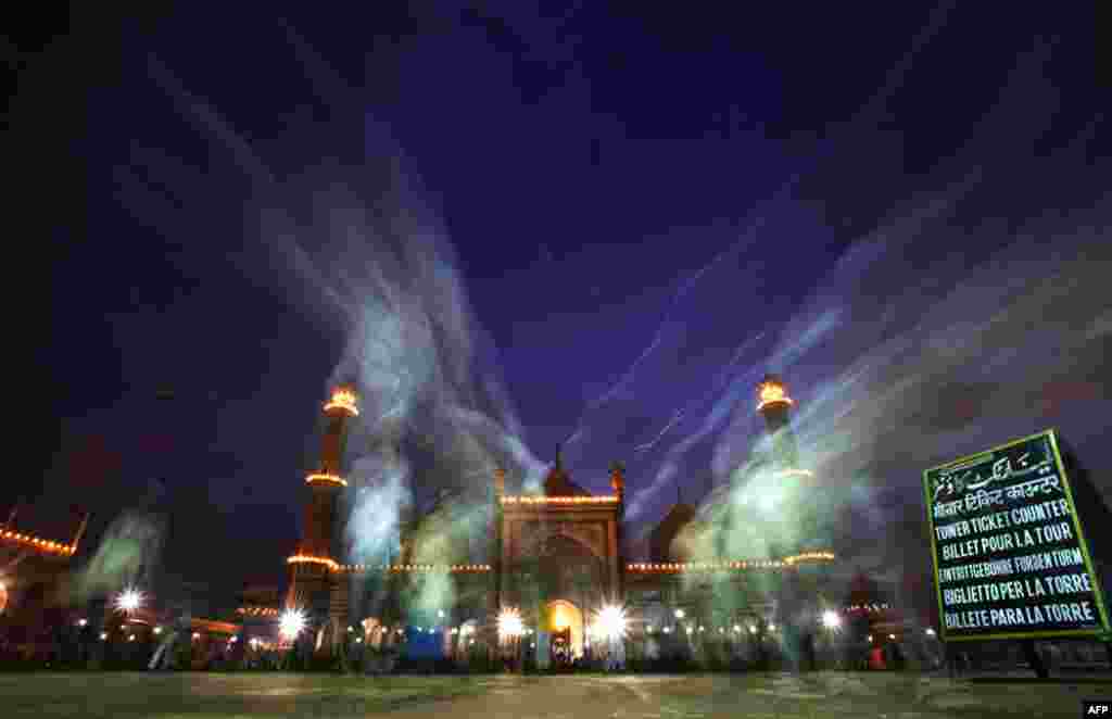 August 2: Muslims leave after their Iftar meal on the first day of the holy month of Ramadan, at the Jama Masjid in Delhi. REUTERS/Adnan Abidi