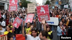 People protest, demanding more affordable housing and better living conditions, in Madrid, Spain, Oct. 13, 2024.