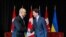 Perdana Menteri Ukraina Denys Shmyhal berjabat tangan dengan Perdana Menteri Kanada Justin Trudeau di Toronto, Ontario, Kanada 11 April 2023. (REUTERS/Carlos Osorio)