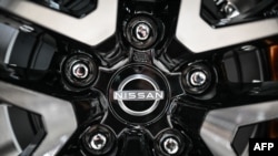 FILE - The emblem of Japanese automaker Nissan Motor is seen at a showroom in Yokohama on May 9, 2024.