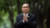 Thailand's Prime Minister Prayuth Chan-ocha gestures while speaking to media members at the Government House in Bangkok, Thailand June 6, 2019.