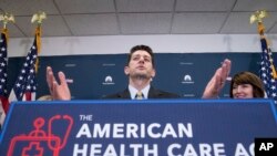 House Speaker Paul Ryan of Wisconsin, accompanied by Rep. Cathy McMorris Rodgers, R-Wash., right, speaks at a news conference following a GOP party conference at the Capitol in Washington, March 15, 2017.