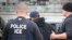FILE - U.S. Immigration and Customs Enforcement makes an arrest in Los Angeles, Feb. 7, 2017.