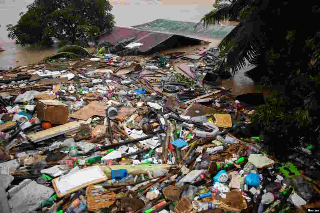 A roof is pictured sumberged in flood following Typhoon Vamco, in San Mateo, Rizal province, Philippines.