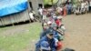 Montagnards from neighbouring Vietnam await registration by United Nations High Commissioner for Refugees staff in Korng village, Ratanakiri province, in 2004.