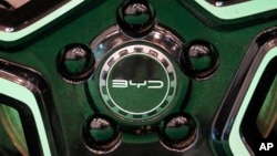 FILE - The wheels of an electric car of Chinese car maker BYD Company on display at the Essen Motor Show in Essen, Germany, on Dec. 1, 2023. 