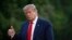 FILE - President Donald Trump gestures as he walks across the South Lawn of the White House in Washington, May 30, 2020.