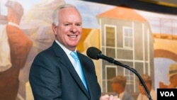 FILE - The U.S. Agency for Global Media’s former Chief Executive John Lansing is photographed preparing to speak in this undated photo taken at USAGM's headquarters in Washington. He died Wednesday in Wisconsin at age 67.