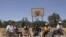 Members of the Rift Valley Wheelchair Basketball group in Eldoret, Kenya, on March 19, 2012. These athletes with disabilities participate together in income-generating activities, community service projects, and sporting events. (Jill Craig/VOA)
