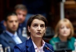 FILE - Serbia's Prime Minister-designate Ana Brnabic addresses the parliament in Belgrade, Serbia, June 28, 2017.