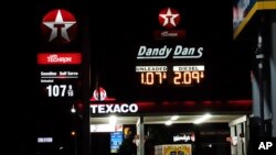 FILE - Gas prices are displayed in Hattiesburg, Miss., April 26, 2020. 