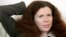 FILE - Russian journalist Yulia Latynina speaks during an interview with Reuters in Moscow, Feb. 25, 2009. 