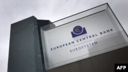 Signage for the headquarters of the European Central Bank (ECB) is seen in Frankfurt, Germany, March 12, 2020.