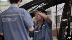 Radnici u kineskoj fabrici automobila "Geely"