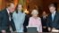 From left, Prince Phillip,  Maria Clemencia Rodriguez de Santos, Queen Elizabeth and President Juan Manuel Santos look at Colombian items from the Royal collection in the picture Gallery of Buckingham Palace, November 1, 2016. 