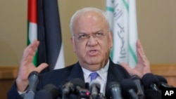 FILE - Palestinian Saeb Erekat, a veteran peace negotiator, speaks during a news conference in the West Bank city of Ramallah, Sept. 11, 2018.