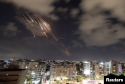 Israel's Iron Dome anti-missile system intercepts rockets, as seen from Ashkelon, Israel, Oct. 1, 2024.